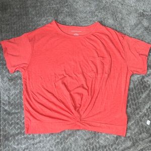 American Eagle orange knot front pocket tee size M